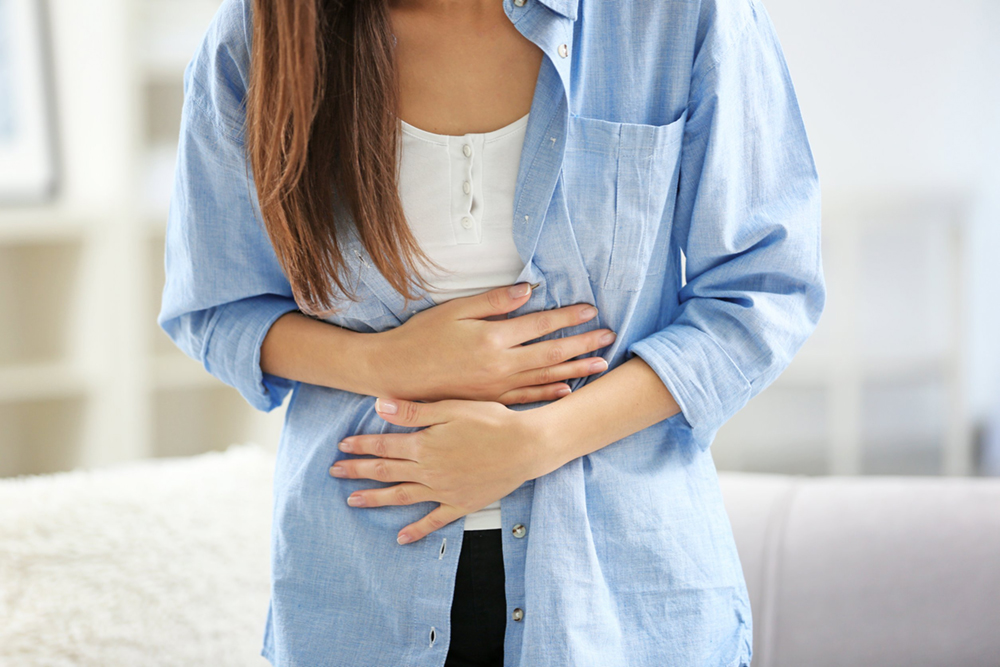 Stomach pain -young woman