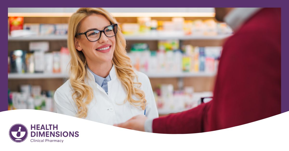 a photo of a pharmacist happily serving a customer